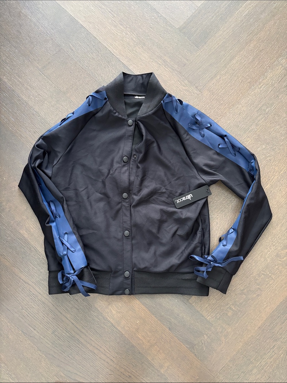 ultracor Black Jacket with Navy Ribbon Sleeve Detail